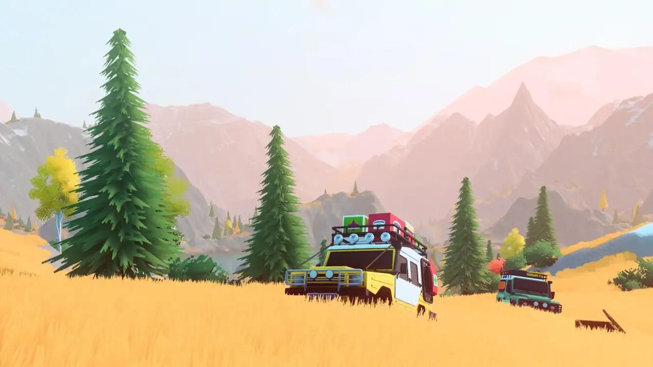 Several off-road vehicles travelling through a Canadian mountain landscape